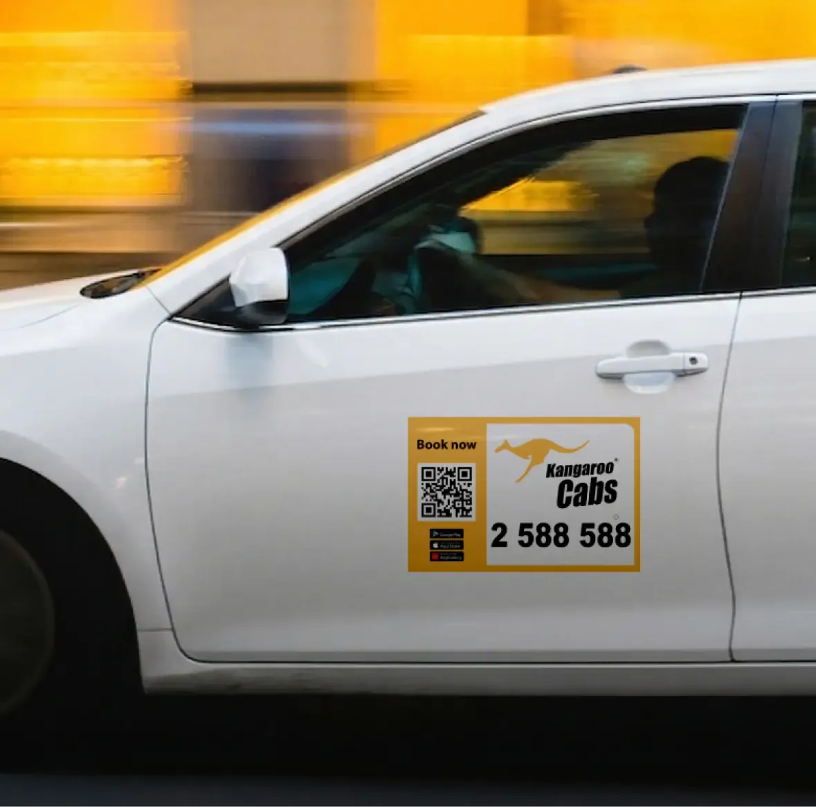 A Kangaroo Cabs vehicle with a book-now QR code on the door
